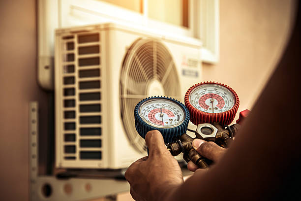 Professional Hvac technician working in State Center, IA
